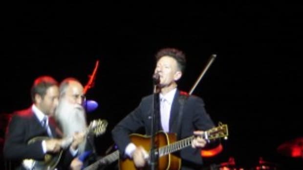Lyle Lovett front with 2 players - best watermarked