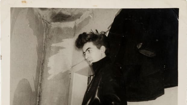A vintage snapshot of 17-year-old George Harrison modeling his first leather jacket, taken in 1960 in Hamburg shortly before his deportation from Germany for being underage (est. $3,000+). Image courtesy of Heritage Auctions.