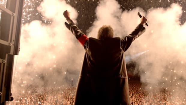 Roger Waters is shown in the concert portion of the film Roger Waters The Wall.
