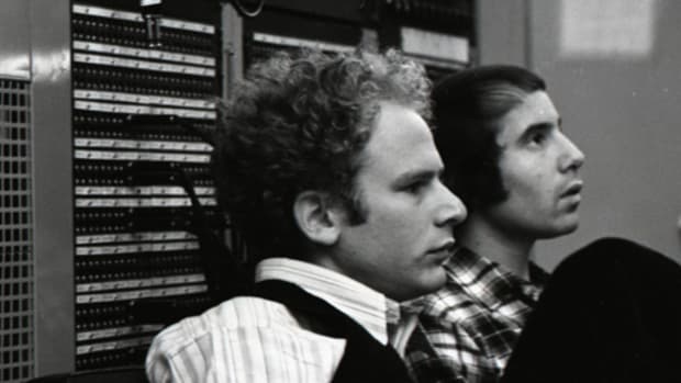 Art Garfunkel in the studio with Paul Simon. Photo by Don Hunstein/courtesy of Sony Music Archives