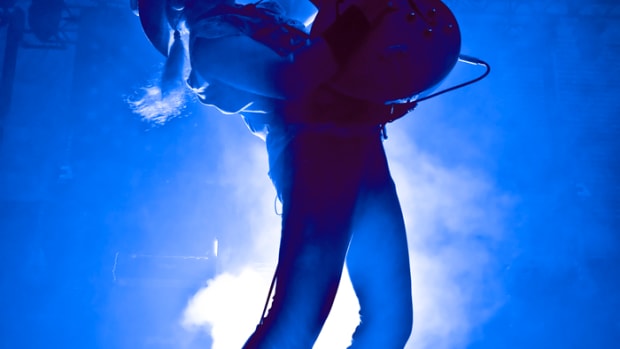  Ted Nugent in blue smoke onstage. Photo by Brown Photography/Courtesy of Ted Nugent.