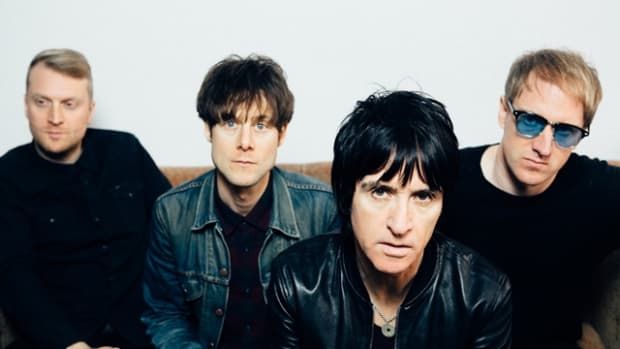  Legendary guitarist Johnny Marr (pictured second from right) and his band (left to right), drummer Jack Mitchell, bassist Iwan Gronow, and guitarist/keyboardist James Doviak, brought Marr’s Call The Comet tour to NYC’s Irving Plaza on Monday, October 15th. (Photo by Niall Lea)