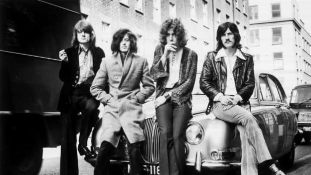  Led Zeppelin’s first photo session with WEA Records posed on a Jaguar car in a London street in December 1968. Photo by Dick Barnatt/Redferns