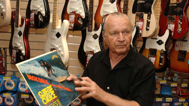  Dick Dale holds up the record Surfers' Choice at the 2009 J&R MusicFest at City Hall Park on August 27, 2009 in New York City. (Photo by Duffy-Marie Arnoult/WireImage)