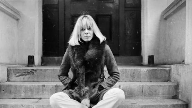  24th October 1968: Italian-born German actress Anita Pallenberg sits cross-legged on a flight of stone steps. (Photo by Larry Ellis/Express/Getty Images)