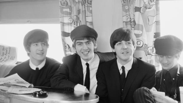  The Beatles posed on a train to Washington during their tour of the U.S. in February 1964.