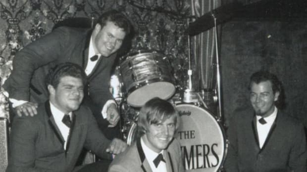  The Brymers (L-R): Kenny Sinner on vocals/keyboards/sax, Jim Mellick on vocals/guitar/harp (standing), Dick Lee on vocals/percussion and Bill Brumley on vocals/bass. Photo courtesy of Dick Lee.