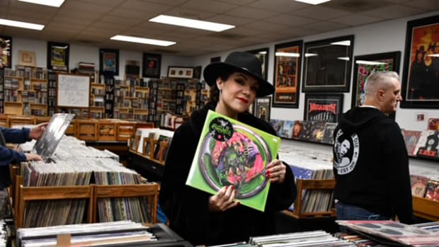 Vocalist Suzi Moon goes record shopping at Hoarders Trading Post in St. Charles, IL.