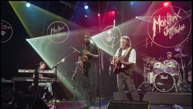 John McLaughlin performing at the Montreux Jazz Festival. Publicity image.