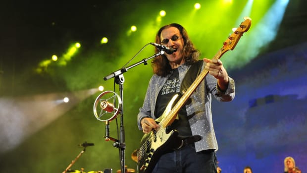 Geddy Lee performing with Rush, 2013