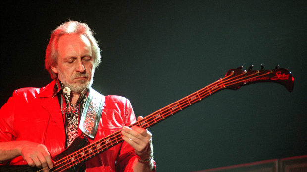 John Entwistle of The Who performing at Ahoy, Rotterdam, 11th May 1997. He plays a Status Graphite Buzzard Bass guitar. (Photo by Rob Verhorst/Hollandse Hoogte/Redferns)