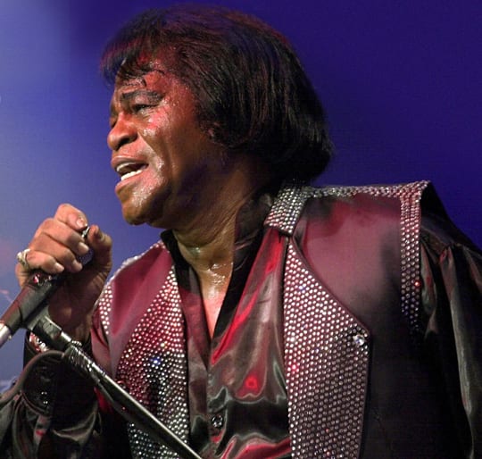 James Brown performs