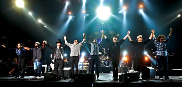 Toto and supporting musicians take a bow during the "Live In Poland" performance. Photo credit Darek Kawka.