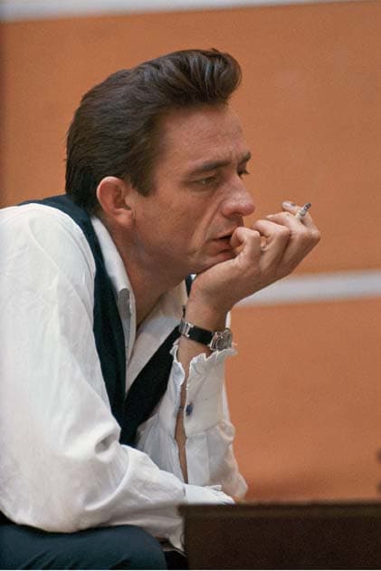 A LIVING PORTRAIT of The Man In Black, shown here in 1965, is being created at www.thejohnnycashproject.com. Photo courtesy Don Hunstein/Copyright Sony BMG Music Entertainment Archives