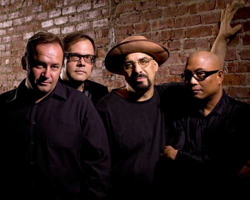Today's incarnation of The Smithereens consists of (from left) Jim Babjak, Dennis Diken, Pat DiNizio and Severo Jornacion, aka “The Thrilla.”