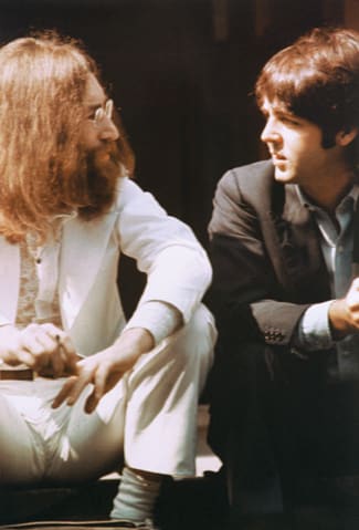 Tensions seem evident in this 1969 photo shot during the Abbey Road cover session. Photo by AP Photo/Linda McCartney