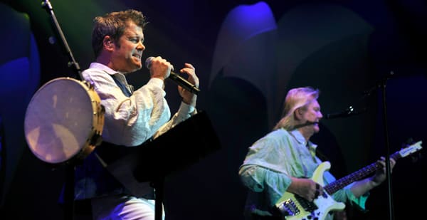 Yes’ new vocalist, Benoit David, left, and bassist Chris Squire, right, onstage in the Czech Republic, 2009. AP Photo/CTK, Vladislav Galgonek