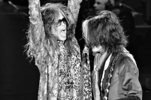 Steven Tyler (left) and Joe Perry share a microphone during the early portion of Aerosmith's Nov. 23 show at Revel in Atlantic City, N.J. (Photo by Chris M. Junior)