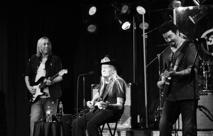 Johnny Winter is flanked by fellow guitarists Paul Nelson (left) and Mike Zito. (Photo by Chris M. Junior)