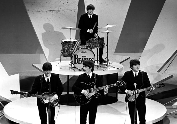 The Beatles perform on "The Ed Sullivan Show," New York, on Feb. 9, 1964. Credit: Apple Corps Ltd.