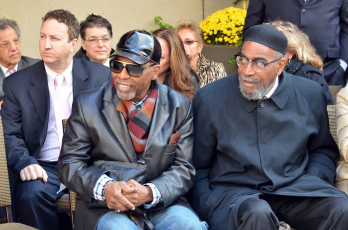 Leon Huff (front left) and Kenneth Gamble take in the Walk of Fame ceremony outside the DoubleTree hotel on South Broad Street. (Photo by Chris M. Junior)