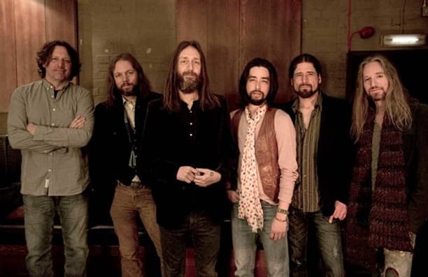 The Black Crowes (from left): Steve Gorman, Rich Robinson, Chris Robinson, Jackie Greene, Sven Pipien and Adam MacDougall. Ross Halfin photo.