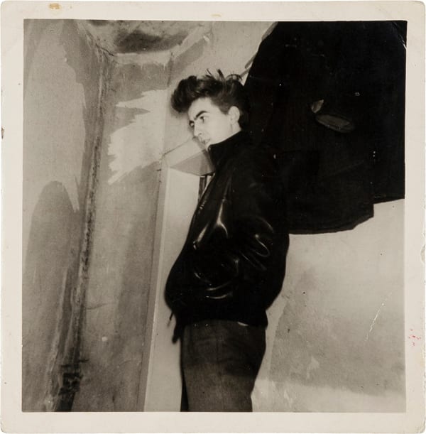 A vintage snapshot of 17-year-old George Harrison modeling his first leather jacket, taken in 1960 in Hamburg shortly before his deportation from Germany for being underage (est. $3,000+). Image courtesy of Heritage Auctions.