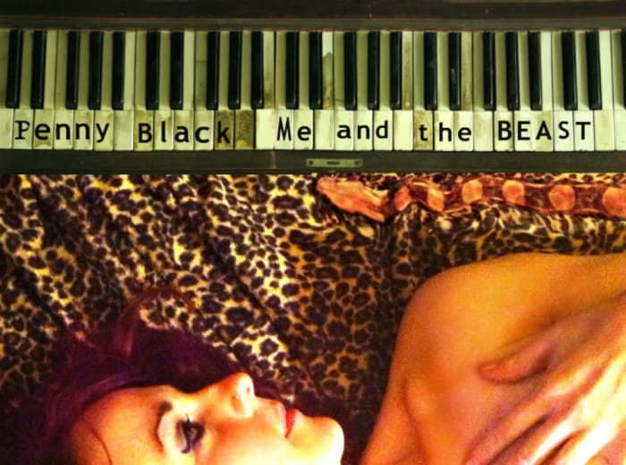 The snake pictured on the cover of Penny Black’s new EP, Me and the Beast, is real. (Photo: Chris Goldsmith 2013)