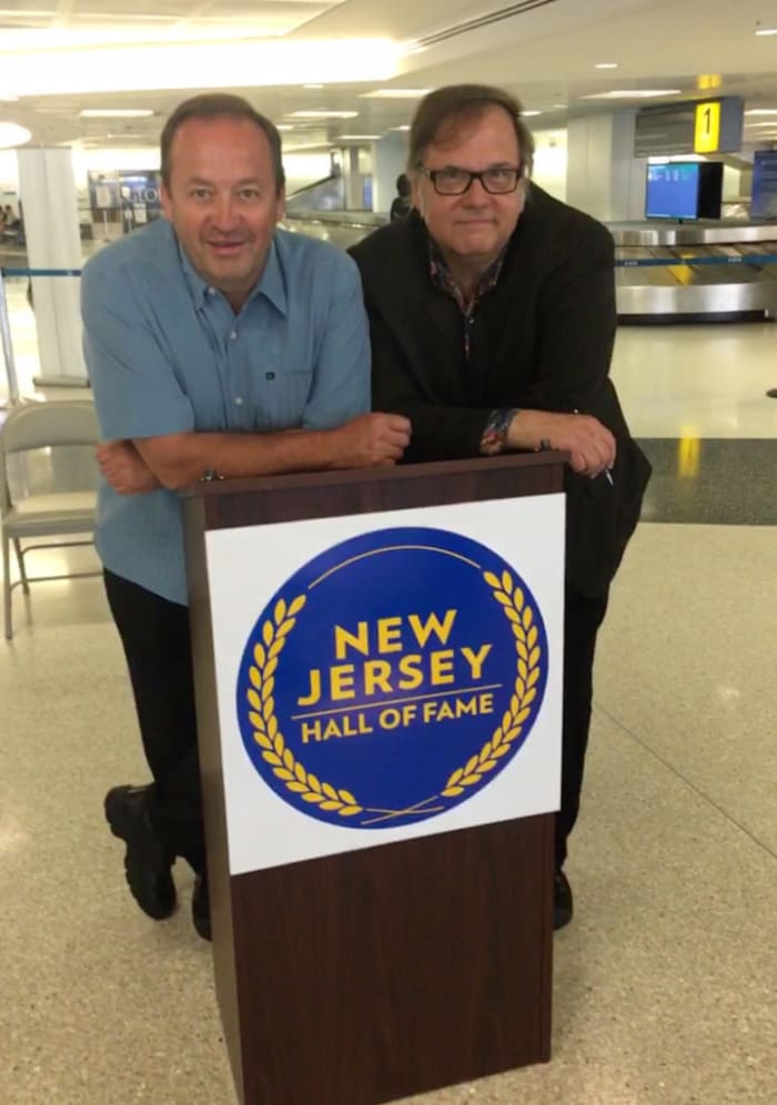 The Smithereens’ Jim Babjak (at left) and Dennis Diken are pictured at the announcement of the 2019 inductees to the New Jersey Hall of Fame at Newark Liberty International Airport on June 1, 2019. Photo by Cindy Sivak.