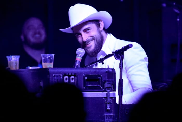 Robert Ellis smiles during his set on the Mohawk outdoor stage on March 15. (Photo by Chris M. Junior)