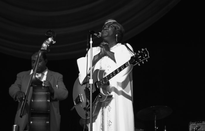 Sister Rosetta Tharpe performs on stage at Hammersmith Odeon, London, 1967. She is playing a Gibson Barney Kessel guitar. (Photo by David Redfern/Redferns)