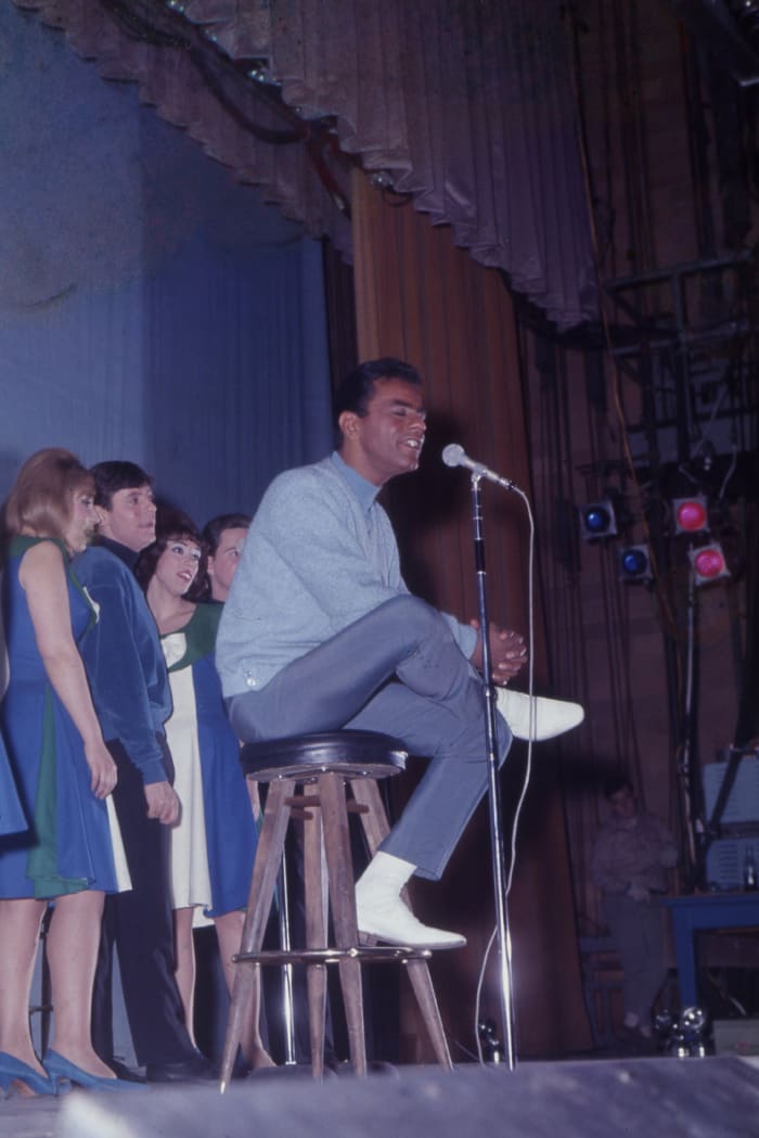 Johnny Mathis performing with backup singers at Seton Hall University on April 26, 1967 (photo courtesy of Frank White Photo Agency).