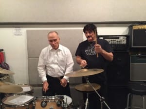 Former NYC Police Commissioner gets drum lessons from Carmine Appice. Photo courtesy of Carmine Appice.