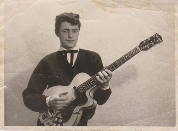 RIGHT OUT OF THE PHOTO ALBUM: A young Ritchie Blackmore posing with one of his first guitars. Photo courtesy of Ritchie Blackmore.