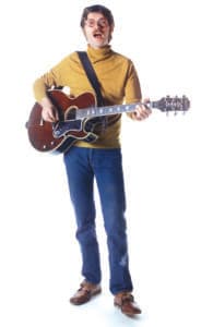 Robbie Robertson poses for a portrait in Saugerties, New York, during the late '60s. (Photo by David Attie/Getty Images)