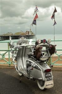 The Mod scooter that features prominently in The Pebble And The Boy promo film is shown here at the Brighton, England seafront with Brighton Pier in the background. (Photo by Gavin Jones)