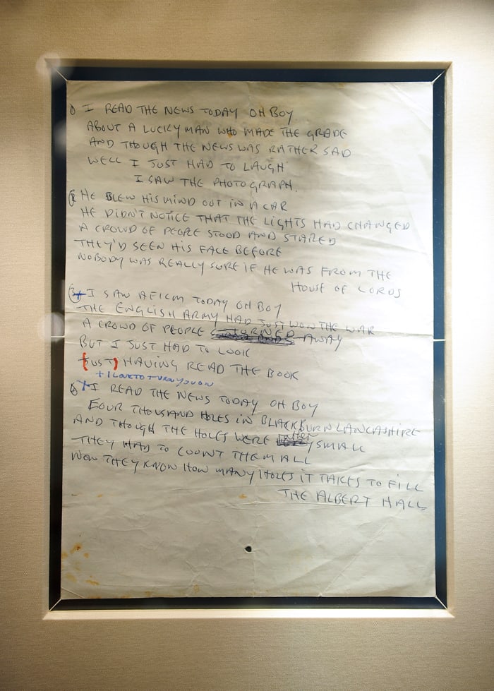 John Lennon’s lyrics for “A Day In The Life.” The double-sided sheet of paper in Lennon’s hand is complete with cross-outs, corrections, reworkings and chronicles the evolution from conception to the lyrics presumably used in the recording studio. The lyrics sold by Sotheby’s in 2010 for $1,202,500 to a private American collector. (Photo by Emmanuel Dunand/AFP/Getty Images)