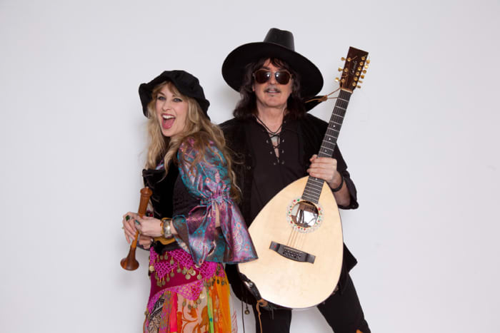 Ritchie Blackmore with his wife, vocalist Candice Night, suited up in this publicity shot for their traditional folk band, Blackmore's Night.