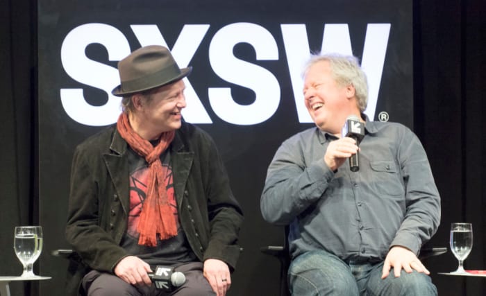 Talking Heads drummer Chris Frantz (right) shares a laugh with Television guitarist Richard Lloyd. (Photo by Chris M. Junior)