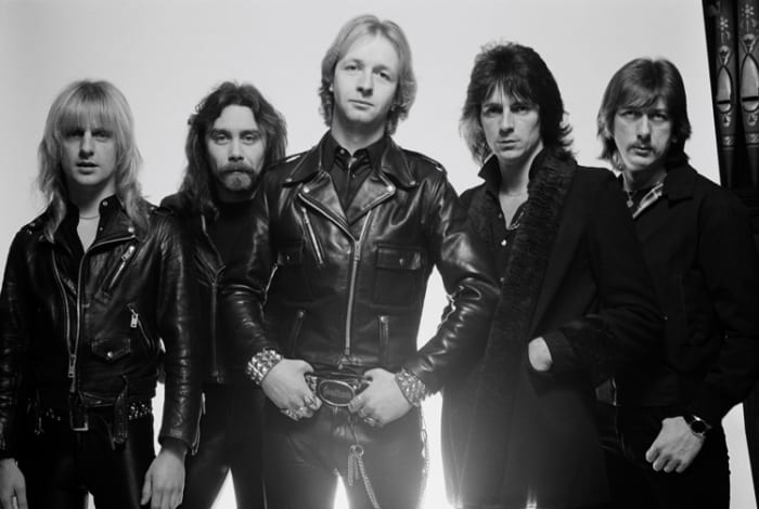 Judas Priest posed for this group shot in London in February 1980. L-R, K.K. Downing, Ian Hill, Rob Halford, Glenn Tipton and Dave Holland. Photo by Fin Costello/Redferns.