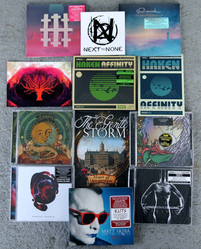 Giveaway of 7" vinyl from The Gentle Storm; CDs from Haken, Three Trapped Tigers, Riverside, Spiritual Beggars, Caligula's Horse, Messenger, Matt Skiba and the Sekrets and Long Distance Calling; postcards Haken and Messenger (autographed); and Next to None logo sticker.