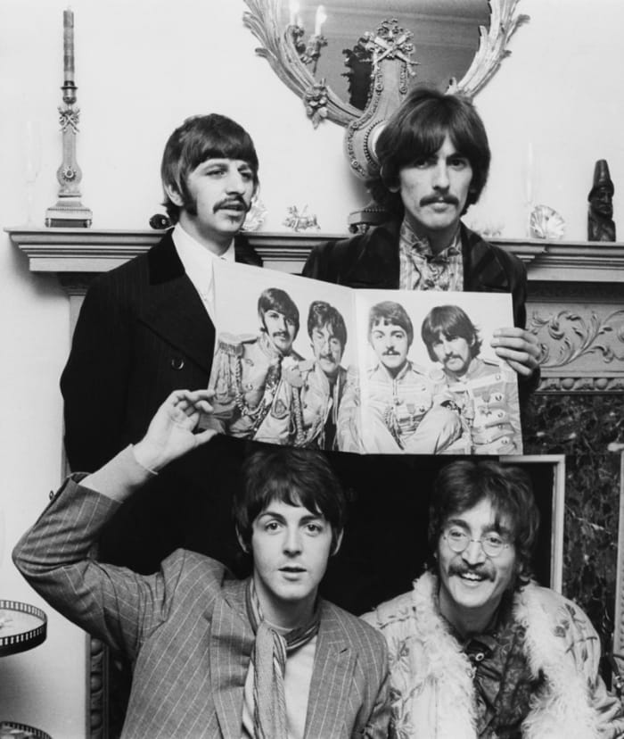 The Beatles during a “Sgt. Pepper” press conference in London on May 20, 1967. (Photo by Keystone-France/Gamma-Keystone via Getty Images)
