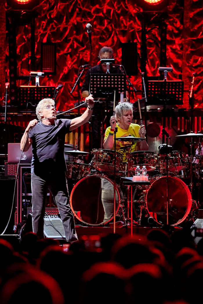 Roger Daltrey whips his microphone around by its lead, lariat style, as Zak Starkey keeps the beat. (Carl Scheffel/MSG Photos)