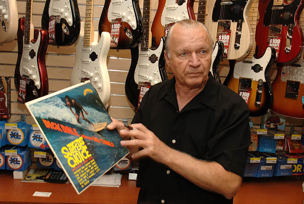 Dick Dale holds up the record Surfers' Choice at the 2009 J&R MusicFest at City Hall Park on August 27, 2009 in New York City. (Photo by Duffy-Marie Arnoult/WireImage)