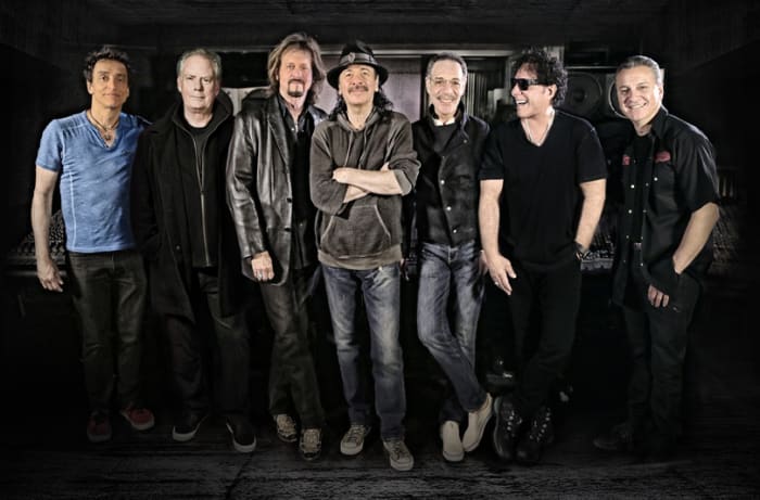 The musicians representing the classic lineup (L-R): Benny Rietveld, Michael Shrieve, Gregg Rolie, Carlos Santana, Michael Carabello, Neal Schon and Karl Perazzo. Publicity photo.
