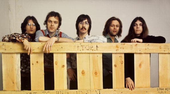 (L-R) Richie Furay, Rusty Young, George Grantham, Paul Cotton and Timothy B Schmit of Poco pose for a group portrait in 1973 in Amsterdam, Netherlands. (Photo by Gijsbert Hanekroot/Redferns)