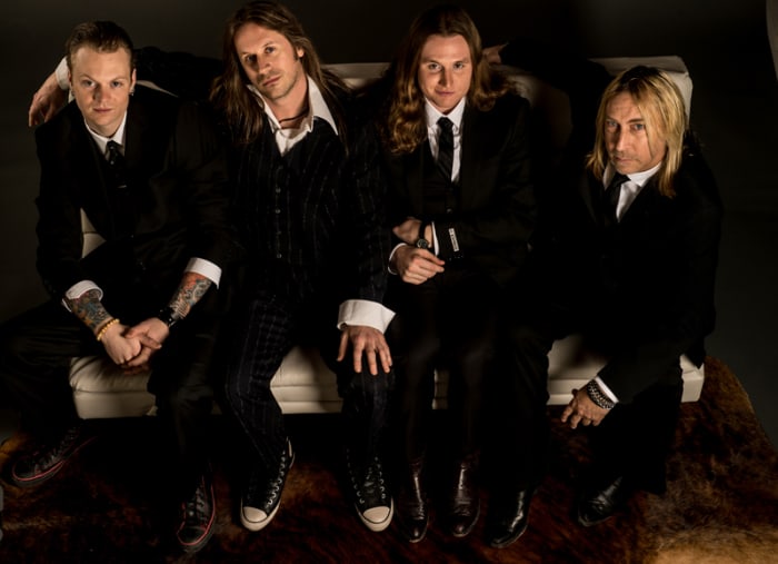 The Paul Nelson Band (L-R): Drummer Chris Reddan, vocalist Morten Fredheim, bassist Christopher Alexander and Paul Nelson. Photo by Michael Weintrob.