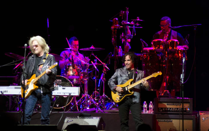 Singer-guitarists Daryl Hall (left) and John Oates in action Feb. 19 at Madison Square Garden in New York. (Photo by Chris M. Junior)
