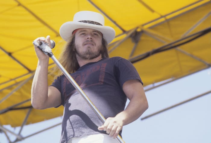 Ronnie Van Zant of Lynyrd Skynyrd performing live at The Oakland Coliseum in 1976. Photo by Richard McCaffrey/Michael Ochs Archive/Getty Images.