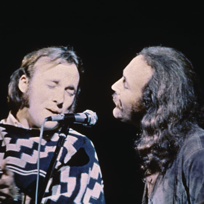 Stephen Stills (left) and David Crosby of the group Crosby, Stills, & Nash performs on stage at the Woodstock Music and Art Festival, Bethel, New York, August 17, 1969. (Photo by Fotos International/Getty Images)